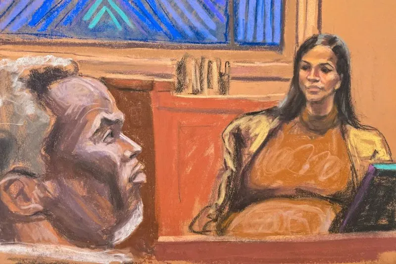 فينتورا، الحامل، تدلي بشهادتها في المحكمة، بينما ينظر إليها كومبس. الصورة تعكس أجواء المحاكمة الجنائية الفيدرالية.