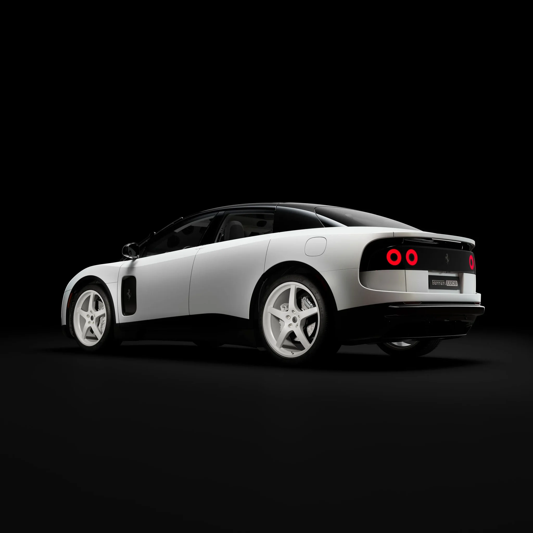 فيراري لوتشي الكهربائية الفاخرة بلون أبيض وأسود، نسخة "Chassis 0" الحصرية التي بيعت بـ40 مليون دولار في مزاد تاريخي.