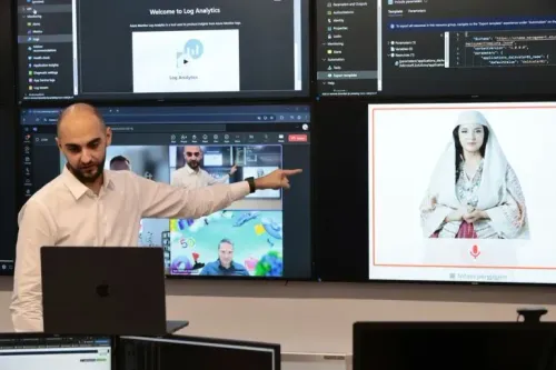 رجل يرتدي قميصًا أبيض يشير إلى شاشة تعرض صورة افتراضية لامرأة ترتدي الزي الشعبي الألباني، في سياق حديث عن الذكاء الاصطناعي.