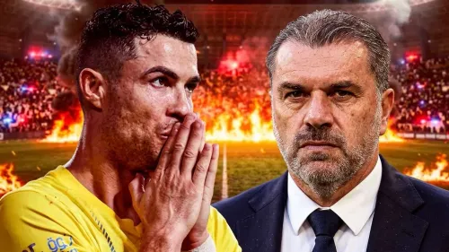 رونالدو بقلق ومدرب الاتحاد ينسق خطة الضغط العالي في كلاسيكو سعودي مشحون وسط أجواء حماسية ونيران في الخلفية.