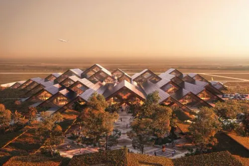 تصميم مطار جيليفو في بوتان يظهر هياكل خشبية على شكل ألماس، ويعكس مفهوم اليقظة الذهنية، مع التركيز على الاستدامة والرفاهية.