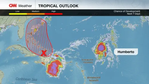 خريطة توضح توقعات العواصف الاستوائية في المحيط الأطلسي، مع تحديد منطقة الخطر والعاصفة هامبرتو.