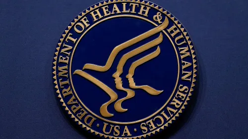 شعار وزارة الصحة والخدمات الإنسانية الأمريكية، يرمز إلى جهود تطوير لقاح عالمي للإنفلونزا لحماية من سلالات متعددة.