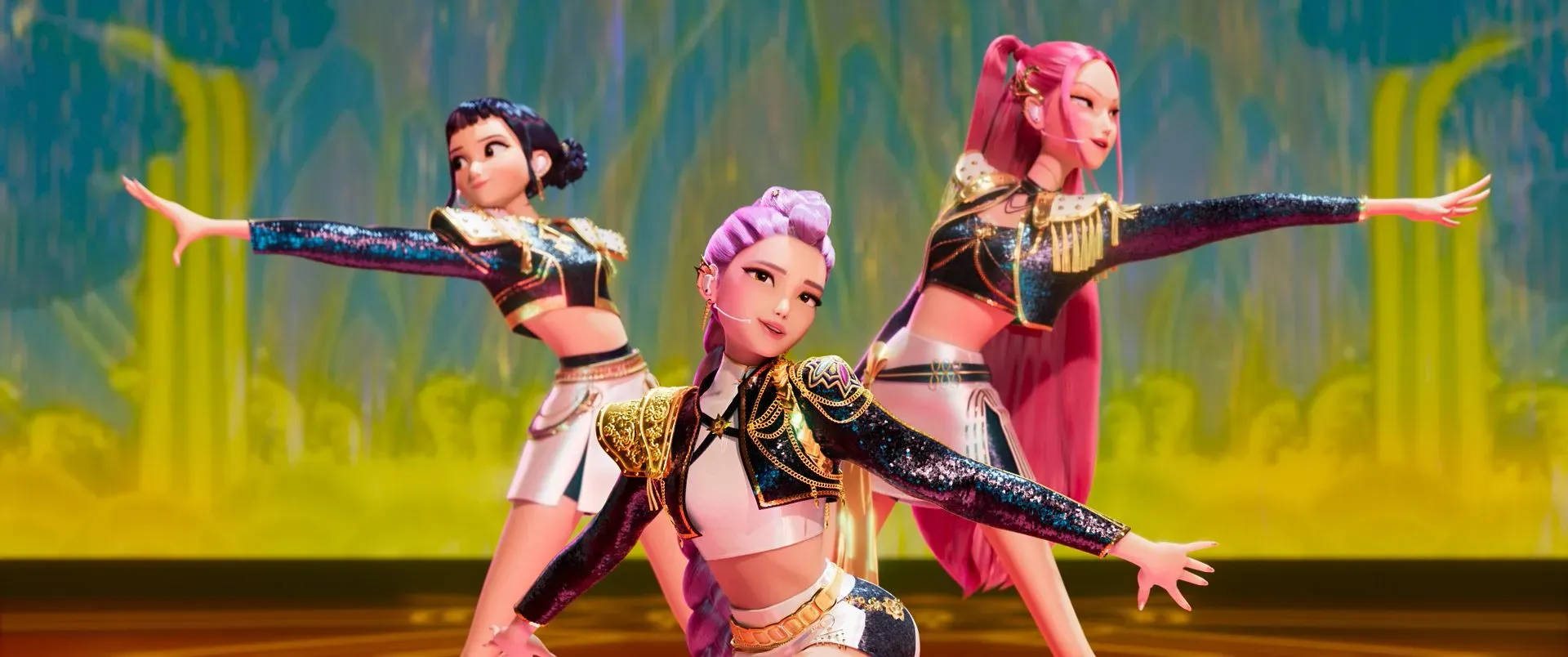 ثلاث شخصيات كرتونية أنثوية تؤدي رقصة متزامنة، يرتدين أزياء لامعة، مع خلفية ملونة تعكس أجواء حيوية ومبهجة.