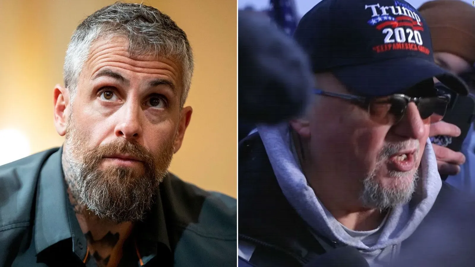 صورة لرجلين، أحدهما ذو لحية وشعر رمادي، والآخر يرتدي قبعة تحمل شعار ترامب، يتحدث في سياق قضايا الشغب المتعلقة بهجوم الكابيتول.